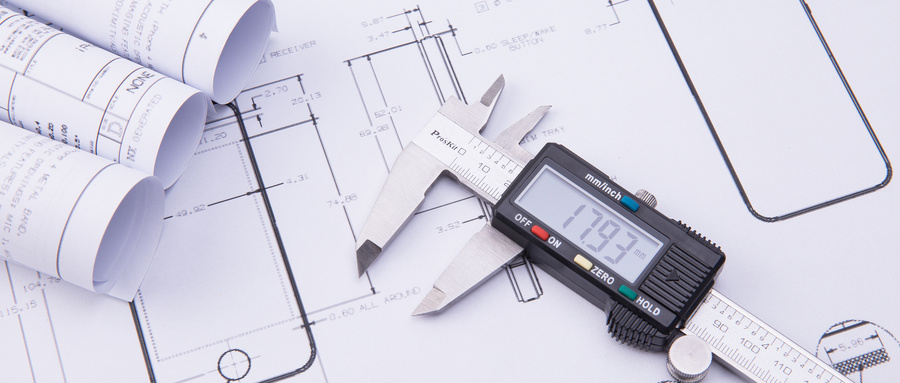 1662450877989163.jpg 摄图网_500511567_wx_工程图纸与游标卡尺(非企业商用).jpg